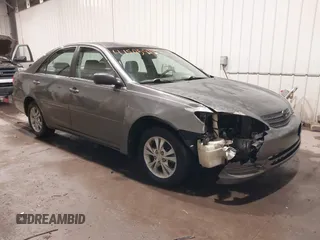 2004 Toyota Camry LE z VIN 4T1BE32K94U804513, wystawiony jako IAAI lot #41505918 z przebiegiem 214 902 mil mil oraz . Historia ofert i sprzedaży dostępna na DreamBid. Obrazek 1.