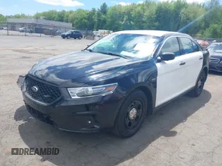 2014 Ford Police Interceptor with VIN 1FAHP2MKXEG185863, listed as a IAAI auction lot 42297860 with 115,188 mi miles and . Bid and sale history available at DreamBid. Image 2.