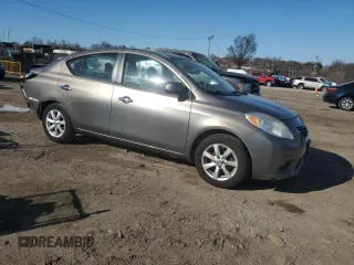 2012 Nissan Versa SV with VIN 3N1CN7APXCL817408, listed as a Copart auction lot 49101125 with 118,417 mi miles and Salvage Title. Bid and sale history available at carsss.com. Image 4.