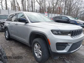 2023 Jeep Grand Cherokee Altitude with VIN 1C4RJHAG9P8909798, listed as a IAAI auction lot 41411422 with 15,960 mi miles. Bid and sale history available at carsss.com. Image 1.