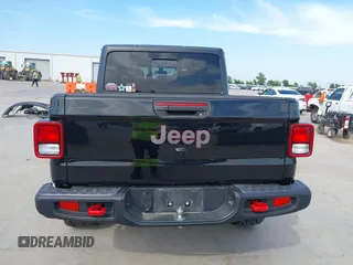 2021 Jeep Gladiator Rubicon z VIN 1C6JJTBG6ML535939, wystawiony jako IAAI lot #42260764 z przebiegiem 114 060 mil mil oraz . Historia ofert i sprzedaży dostępna na DreamBid. Obrazek 16.