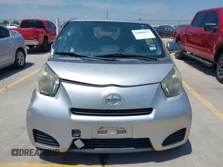 2012 Scion iQ with VIN JTNJJXB07CJ018562, listed as a IAAI auction lot 42404672 with 79,867 mi miles and . Bid and sale history available at DreamBid. Image 13.