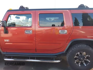 2003 Hummer H2 with VIN 5GRGN23U23H104200, listed as a IAAI auction lot 41687769 with 1 mi miles. Bid and sale history available at carsss.com. Image 14.