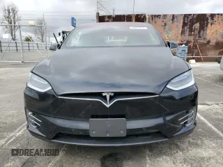 2018 Tesla Model X 75D with VIN 5YJXCBE24JF130216, listed as a Copart auction lot 48894215 with 75,694 mi miles and Salvage Title. Bid and sale history available at carsss.com. Image 5.