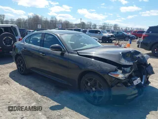 2021 Alfa Romeo Giulia Ti z VIN ZARFANBN6M7648815, wystawiony jako IAAI lot #42092016 z przebiegiem 50 195 mil mil oraz . Historia ofert i sprzedaży dostępna na DreamBid. Obrazek 1.