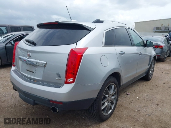2015 Cadillac SRX Performance Collection z VIN 3GYFNCE36FS633386, wystawiony jako IAAI lot #41851338 z przebiegiem 102 586 mil mil oraz . Historia ofert i sprzedaży dostępna na DreamBid. Obrazek 4.