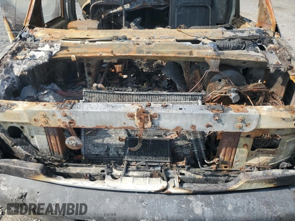 2004 Ford Econoline Cargo z VIN 1FTNE24LX4HA56316, wystawiony jako Copart lot #70838654 z przebiegiem Nie podano mil oraz Szkoda całkowita • Salvage title. Historia ofert i sprzedaży dostępna na DreamBid. Obrazek 12.