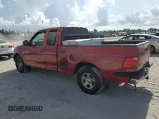 2000 Ford F-150 XL with VIN 2FTZX0724YCA62788, listed as a Copart auction lot 60301585 with Not provided miles and Clean title. Bid and sale history available at DreamBid. Image 2.