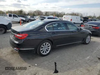 2018 BMW 7 Series 740i xDrive with VIN WBA7E4C54JGV23901, listed as a Copart auction lot 77322824 with 70,922 mi miles and Salvage Title. Bid and sale history available at carsss.com. Image 3.
