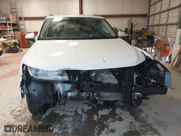 2020 Volkswagen Tiguan SE with VIN 3VV3B7AX4LM141023, listed as a IAAI auction lot 41521923 with 69,479 mi miles and . Bid and sale history available at DreamBid. Image 13.
