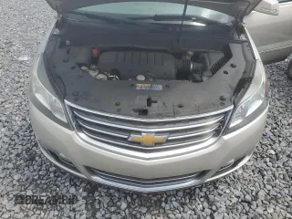 2015 Chevrolet Traverse LTZ z VIN 1GNKRJKD8FJ269524, wystawiony jako Copart lot #56700805 z przebiegiem 110 605 mil mil oraz Szkoda całkowita • Salvage title. Historia ofert i sprzedaży dostępna na DreamBid. Obrazek 12.