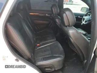 2014 Kia Sorento SX Limited z VIN 5XYKWDA71EG501636, wystawiony jako Copart lot #72324524 z przebiegiem 166 496 mil mil oraz Szkoda całkowita • Salvage title. Historia ofert i sprzedaży dostępna na DreamBid. Obrazek 11.