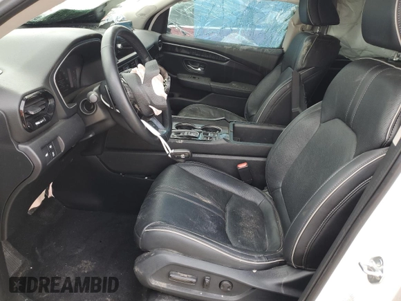 2023 Honda Pilot Elite z VIN 5FNYG1H81PB045653, wystawiony jako Copart lot #51252065 z przebiegiem 57 388 mil mil oraz Szkoda całkowita • Salvage title. Historia ofert i sprzedaży dostępna na DreamBid. Obrazek 7.
