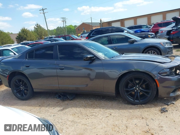 2018 Dodge Charger SXT Plus with VIN 2C3CDXHG6JH253191, listed as a IAAI auction lot 41988535 with 69,320 mi miles and . Bid and sale history available at carsss.com. Image 13.