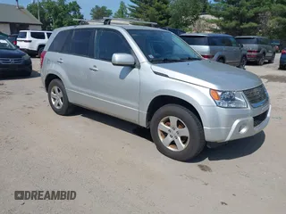 2012 Suzuki Grand Vitara Premium z VIN JS3TD0D61C4100526, wystawiony jako IAAI lot #42526106 z przebiegiem 267 906 mil mil oraz . Historia ofert i sprzedaży dostępna na DreamBid. Obrazek 1.