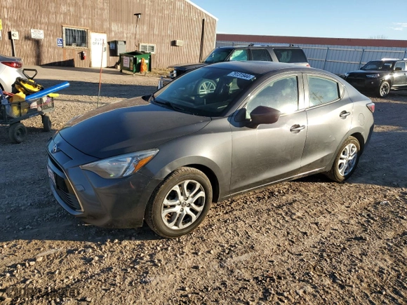 2017 Toyota Yaris iA with VIN 3MYDLBYV4HY153133, listed as a Copart auction lot 79131944 with 132,514 mi miles and Salvage Title. Bid and sale history available at carsss.com. Image 1.