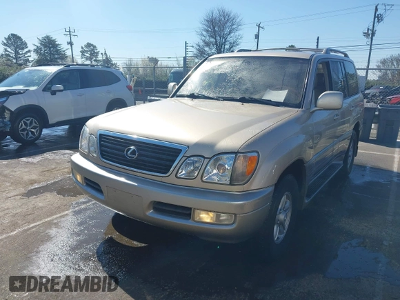 2000 Lexus LX 470 with VIN JT6HT00W8Y0118377, listed as a IAAI auction lot 41787649 with 230,442 mi miles and . Bid and sale history available at carsss.com. Image 2.