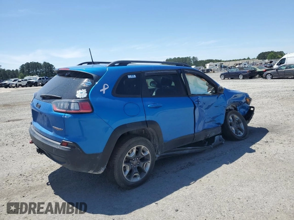 2019 Jeep Cherokee Trailhawk Elite z VIN 1C4PJMBXXKD309306, wystawiony jako Copart lot #53428305 z przebiegiem 99 448 mil mil oraz Szkoda całkowita • Salvage title. Historia ofert i sprzedaży dostępna na DreamBid. Obrazek 3.
