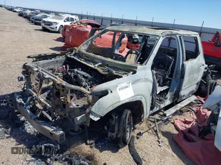 2023 Toyota Tundra Limited Hybrid with VIN 5TFJC5EC6PX004292, listed as a IAAI auction lot 41826063 with Not provided miles and . Bid and sale history available at DreamBid. Image 2.