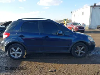 2008 Suzuki SX4 with VIN JS2YB413285101655, listed as a IAAI auction lot 41552760 with 180,736 mi miles. Bid and sale history available at carsss.com. Image 12.