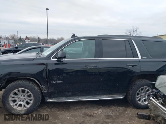 2016 GMC Yukon SLE with VIN 1GKS2AKC2GR357481, listed as a IAAI auction lot 41715909 with 165,377 mi miles. Bid and sale history available at carsss.com. Image 14.