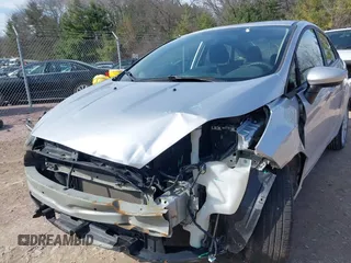2018 Ford Fiesta SE with VIN 3FADP4BJ4JM134833, listed as a IAAI auction lot 41924079 with 76,781 mi miles and . Bid and sale history available at DreamBid. Image 6.