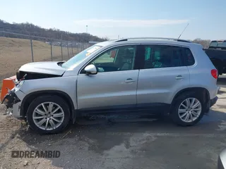 2011 Volkswagen Tiguan SE with VIN WVGBV7AX2BW562055, listed as a IAAI auction lot 41642084 with 175,407 mi miles and . Bid and sale history available at DreamBid. Image 14.