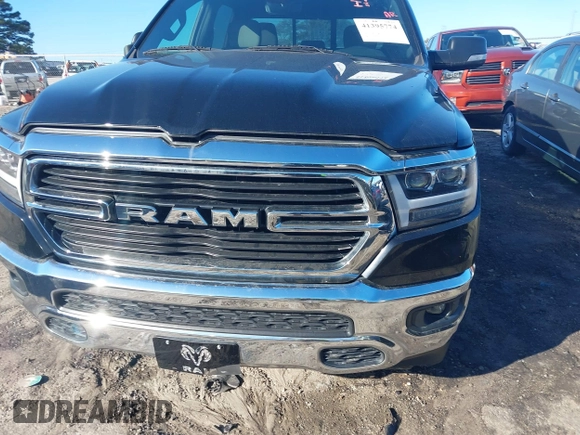 2021 Ram 1500 Big Horn z VIN 1C6RREFG1MN532758, wystawiony jako IAAI lot #41395774 z przebiegiem 66 750 mil mil oraz . Historia ofert i sprzedaży dostępna na DreamBid. Obrazek 11.