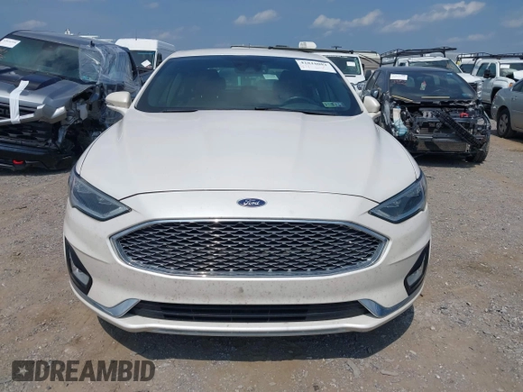 2019 Ford Fusion Titanium with VIN 3FA6P0SU8KR192833, listed as a IAAI auction lot 42818081 with 71,188 mi miles and . Bid and sale history available at DreamBid. Image 12.