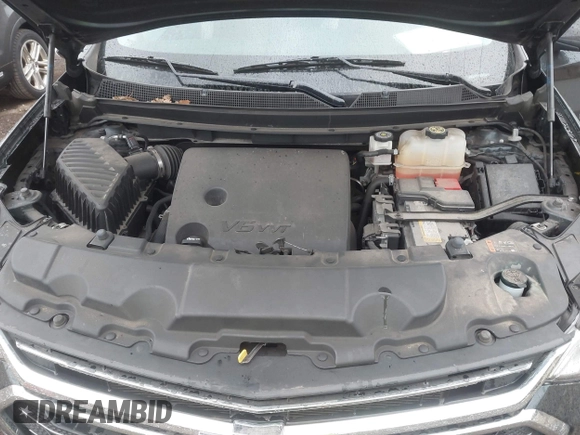 2021 Chevrolet Traverse LT Cloth z VIN 1GNERGKW9MJ234571, wystawiony jako IAAI lot #41844031 z przebiegiem 58 785 mil mil oraz . Historia ofert i sprzedaży dostępna na DreamBid. Obrazek 10.