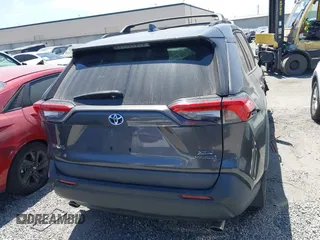 2020 Toyota RAV4 Hybrid XLE with VIN 2T3RWRFV5LW058103, listed as a IAAI auction lot 42665299 with 112,634 mi miles and . Bid and sale history available at DreamBid. Image 17.