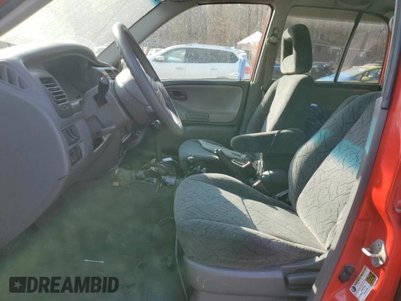 2004 Chevrolet Tracker ZR2 z VIN 2CNBJ734X46910549, wystawiony jako Copart lot #80849894 z przebiegiem Nie podano mil oraz Szkoda całkowita • Salvage title. Historia ofert i sprzedaży dostępna na DreamBid. Obrazek 7.