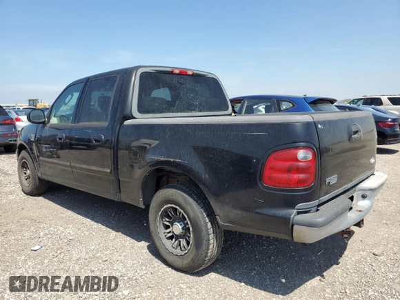 2003 Ford F-150 XLT with VIN 1FTRW07623KD82847, listed as a Copart auction lot 50303265 with 156,781 mi miles and Clean Title. Bid and sale history available at carsss.com. Image 2.