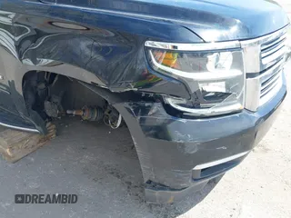 2015 Chevrolet Tahoe LTZ with VIN 1GNSKCKC8FR514671, listed as a IAAI auction lot 42157084 with 182,665 mi miles and . Bid and sale history available at DreamBid. Image 6.