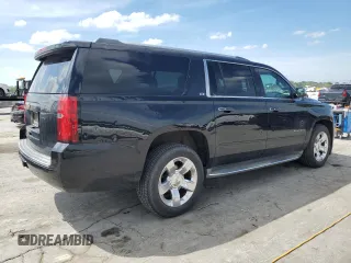 2015 Chevrolet Suburban LTZ with VIN 1GNSCKKC9FR151532, listed as a Copart auction lot 54209315 with 122,380 mi miles and Salvage title. Bid and sale history available at DreamBid. Image 3.