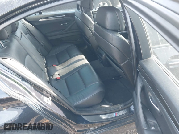 2013 BMW 5 Series 550i xDrive with VIN WBAFU9C52DDY70807, listed as a IAAI auction lot 41663855 with 92,009 mi miles and . Bid and sale history available at carsss.com. Image 8.