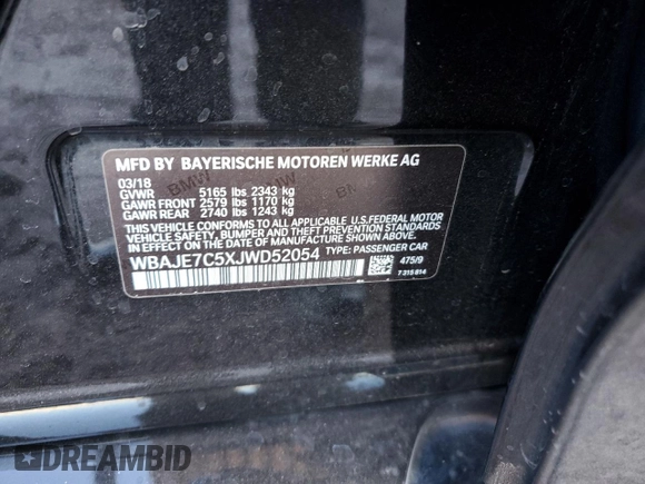 2018 BMW 5 Series 540i xDrive with VIN WBAJE7C5XJWD52054, listed as a Copart auction lot 47306535 with 49,185 mi miles and Salvage title. Bid and sale history available at DreamBid. Image 12.