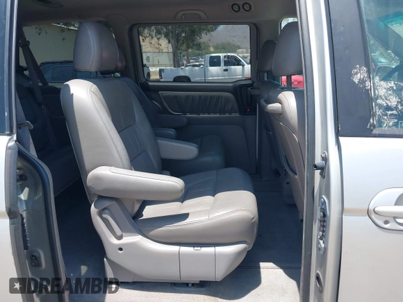 2004 Honda Odyssey EX-L with VIN 5FNRL18774B028164, listed as a IAAI auction lot 42454877 with 135,720 mi miles and . Bid and sale history available at DreamBid. Image 8.
