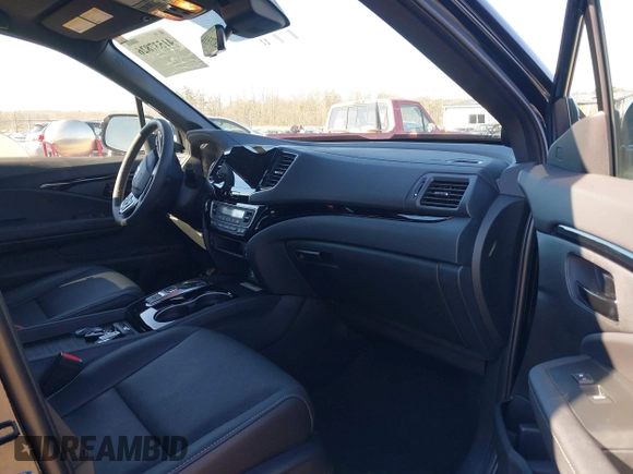 2023 Honda Passport Elite with VIN 5FNYF8H04PB006514, listed as a IAAI auction lot 41537826 with 14,640 mi miles and . Bid and sale history available at DreamBid. Image 5.