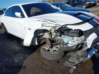 2020 Dodge Charger R/T with VIN 2C3CDXCT5LH159956, listed as a IAAI auction lot 41310991 with 127,743 mi miles and . Bid and sale history available at carsss.com. Image 1.