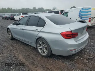 2018 BMW 3 Series 330i with VIN WBA8B9G50JNU98561, listed as a Copart auction lot 61293325 with 106,656 mi miles and Clean title. Bid and sale history available at DreamBid. Image 2.