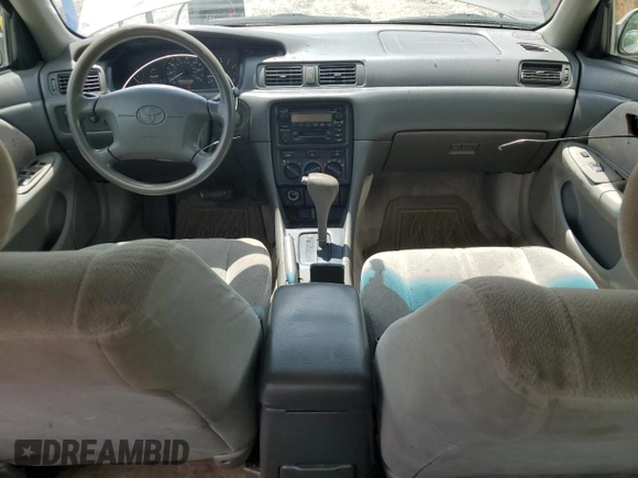2000 Toyota Camry CE z VIN 4T1BG22K5YU013891, wystawiony jako Copart lot #56693255 z przebiegiem 248 922 mil mil oraz Szkoda całkowita • Salvage title. Historia ofert i sprzedaży dostępna na DreamBid. Obrazek 8.