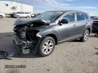 2014 Mazda CX-9 Sport with VIN JM3TB2BVXE0431035, listed as a Copart auction lot 87637505 with 126,973 mi miles and Salvage title. Bid and sale history available at DreamBid. Image 1.