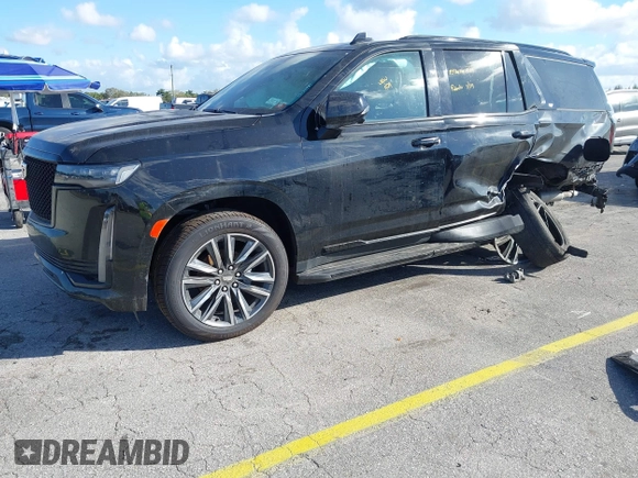 2023 Cadillac Escalade 4WD Sport z VIN 1GYS4EKL2PR351882, wystawiony jako IAAI lot #41555895 z przebiegiem 58 703 mil mil oraz . Historia ofert i sprzedaży dostępna na DreamBid. Obrazek 19.