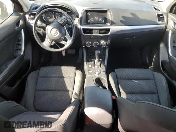 2016 Mazda CX-5 Touring z VIN JM3KE2CY5G0617516, wystawiony jako Copart lot #56421005 z przebiegiem 110 739 mil mil oraz Szkoda całkowita • Salvage title. Historia ofert i sprzedaży dostępna na DreamBid. Obrazek 8.