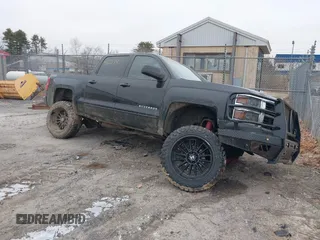 2015 Chevrolet Silverado 1500 LT with VIN 3GCUKREC5FG400210, listed as a IAAI auction lot 41162133 with 118,015 mi miles. Bid and sale history available at carsss.com. Image 1.