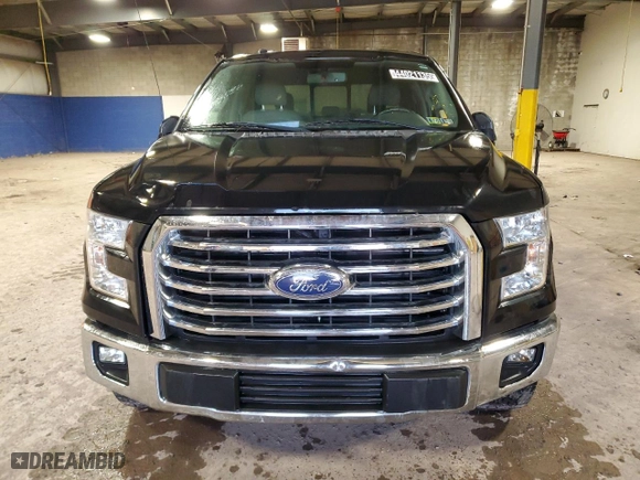 2015 Ford F-150 XLT w/HD Payload Pkg with VIN 1FTFW1EF9FFB08831, listed as a Copart auction lot 44021135 with 168,236 mi miles and Clean Title. Bid and sale history available at carsss.com. Image 5.