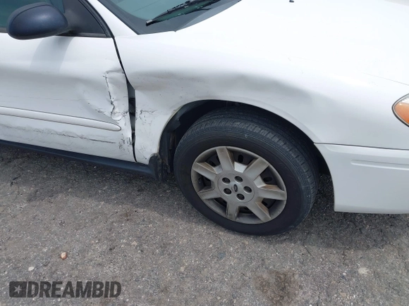 2007 Ford Taurus SE z VIN 1FAFP53U57A101188, wystawiony jako IAAI lot #42102585 z przebiegiem Nie podano mil oraz . Historia ofert i sprzedaży dostępna na DreamBid. Obrazek 6.