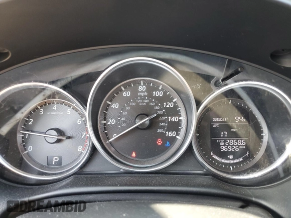 2014 Mazda CX-5 Sport with VIN JM3KE2BE7E0334880, listed as a Copart auction lot 61780635 with 96,926 mi miles and Salvage title. Bid and sale history available at DreamBid. Image 9.