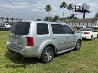 2010 Honda Pilot Touring with VIN 5FNYF3H86AB015716, listed as a Copart auction lot 54362235 with 229,256 mi miles and Clean Title. Bid and sale history available at carsss.com. Image 4.